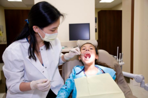 pediatric dentist child in chair 300x200 - pediatric_dentist_child_in_chair