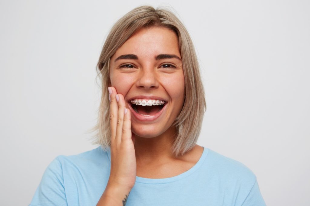 woman braces smilling 1024x682 - Relatable Reasons Why Adults Should Consider Braces